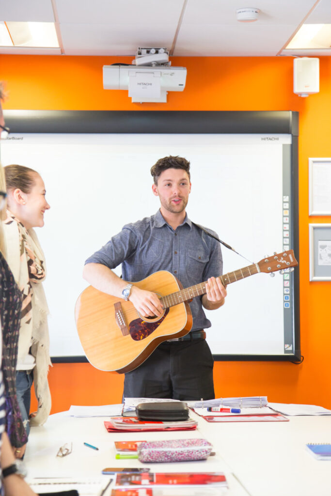 An English teacher during a lesson – EC Brighton