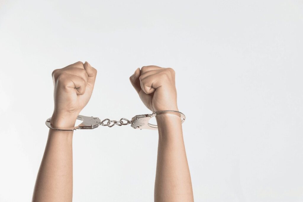 hands in handcuffs