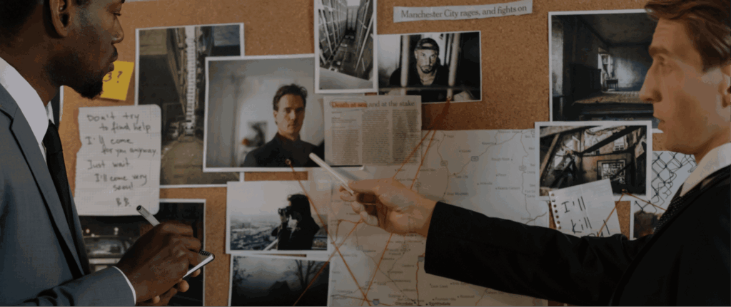 Detectives examining evidence during a criminal investigation